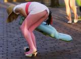  1-a-young-woman-in-fancy-dress-bends-to-
 pick-up-her-shoe-during-a-carnage-studen
t-event-in-lincoln_387.jpg