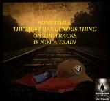 Lonely Railroad Track With Hats And Shoe Ad.jpg